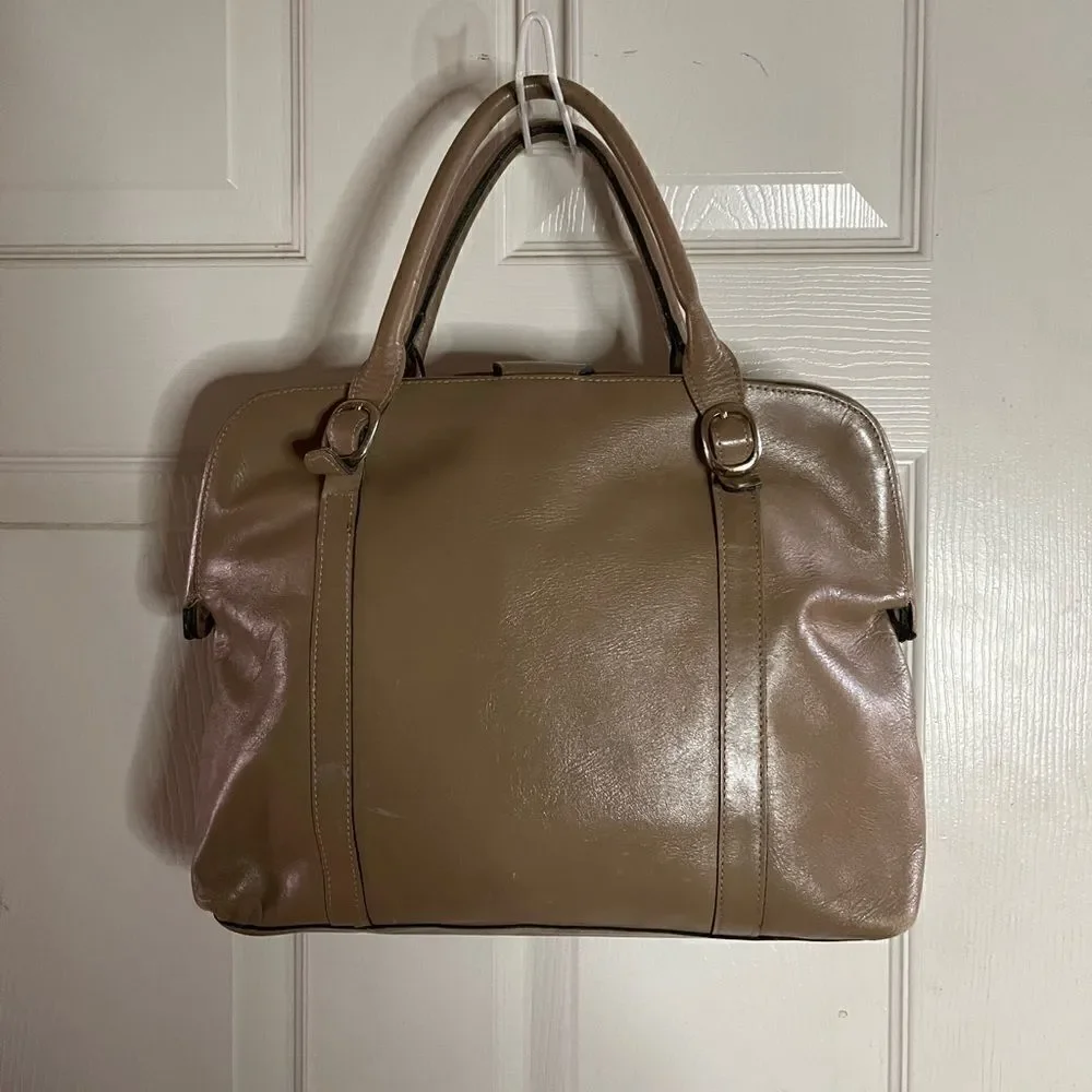 Tano Leather tan frame medium satchel gold tone hardwares .